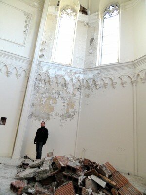 David Torke of fixBuffalo stands amid rubble inside St. Matthew's