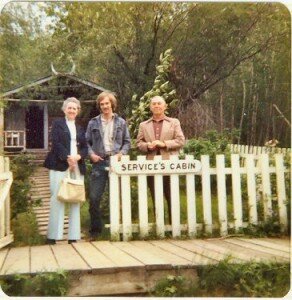 image of a young man flanked by an old woman and man